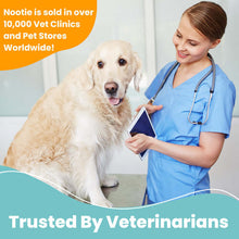 Load image into Gallery viewer, Veterinarian with golden retriever in clinic, promoting Nootie products sold in 10,000 vet clinics worldwide.