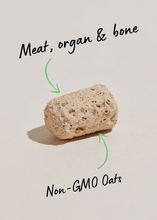 Load image into Gallery viewer, Close-up of a freeze-dried morsel showing meat, organ, bone, and non-GMO oats for dog nutrition.