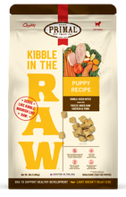 Load image into Gallery viewer, Kibble in the Raw Puppy Recipe dog food packaging featuring freeze-dried chicken and pork bites for optimal nutrition.