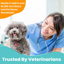 Load image into Gallery viewer, Veterinarian smiling at a happy dog, promoting Nootie products in clinics and pet stores worldwide.