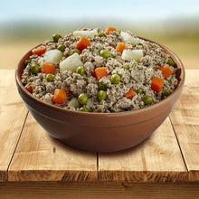 Load image into Gallery viewer, Fromm Bonnihill Farms TurkiBowls in a brown bowl with vegetables on a wooden surface.
