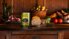 Load image into Gallery viewer, Fromm Lamb & Sweet Potato Pate can on wooden table surrounded by fresh vegetables and meats.