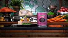 Load image into Gallery viewer, Fromm Salmon & Chicken Pate 12oz can with a gourmet serving of pet food, featuring vegetables and a rustic kitchen backdrop.