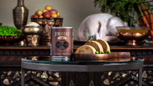Load image into Gallery viewer, Fromm Turkey Pate 12oz on a table with sliced pate and green peas, showcasing premium pet food.