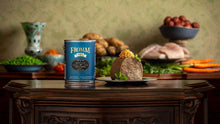 Load image into Gallery viewer, Fromm Whitefish & Lentil Pate 12oz can beside a serving of pet food on a decorative table with fresh vegetables.