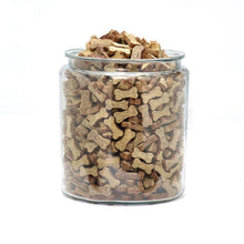 Load image into Gallery viewer, Clear jar filled with Polka Dog bulk dehydrated duck biscuits shaped like dog bones.