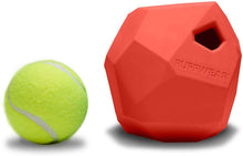 Load image into Gallery viewer, Ruffwear Gnawt-a-Rock chew toy next to a standard tennis ball, showcasing its unique shape and durable material.