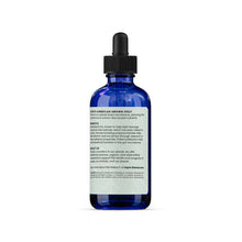 Load image into Gallery viewer, Adored Beast Myco-Biome turkey tail mushroom extract liquid in blue glass bottle with dropper.