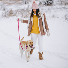 Load image into Gallery viewer, Viper Biothane 20 ft Dog Leash - Long Line Lead used by a woman walking her dog in the snow.