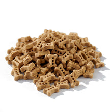 Load image into Gallery viewer, Buck Bone Organics antler dog biscuits piled up, made with real beef and antler powder, crunchy texture.
