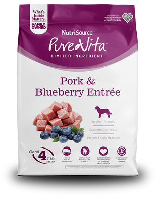 NutriSource Pure Vita Pork & Blueberry for Dogs Limited Ingredient dog food bag with pork and blueberries.