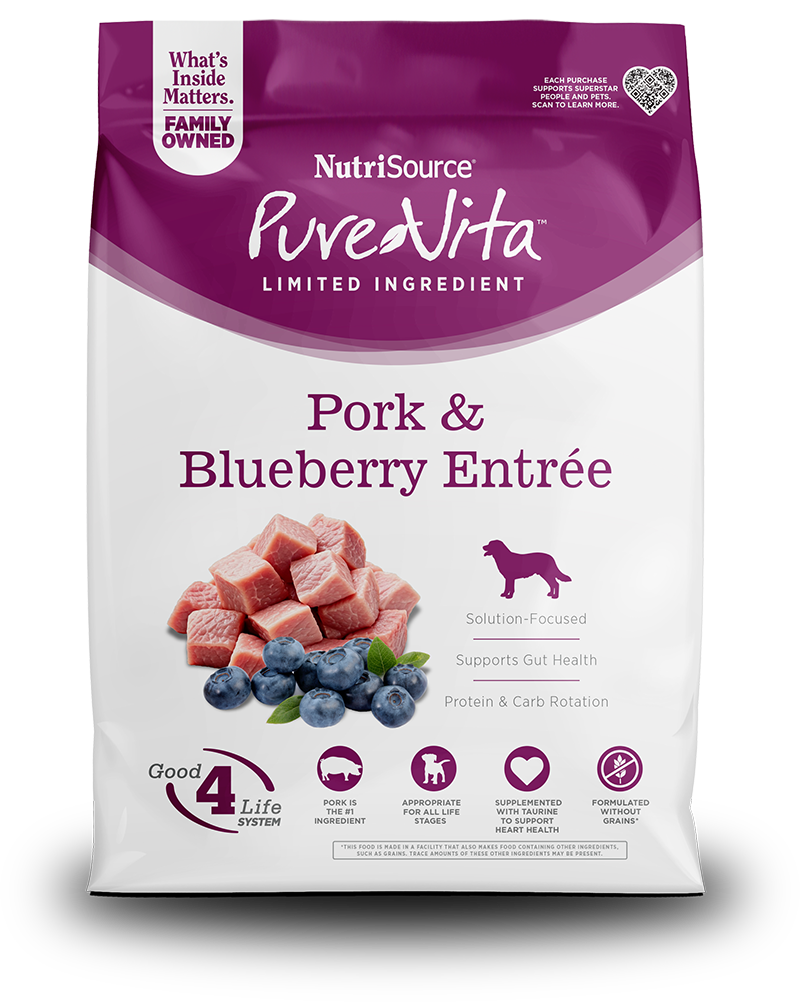NutriSource Pure Vita Pork & Blueberry for Dogs Limited Ingredient dog food bag with pork and blueberries.
