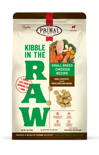 Kibble in the Raw Small Breed Chicken Recipe dog food packaging with freeze-dried bites and nutritious ingredients.