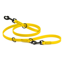 Load image into Gallery viewer, Biothane Adjustable Multi-Purpose Dog Leash with Black Hardware, 7FT, shown in yellow with adjustable lengths and clips.