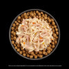 Go! Cat Booster Pouches 2.5oz served as a meal topper on dry cat food in a bowl.