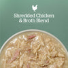 Shredded Chicken & Broth Blend in a bowl, showcasing a delicious meal option for pets.