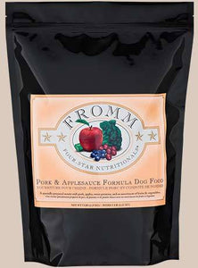 Fromm Four-Star Pork & Applesauce dog food bag featuring pork, apples, and vegetables in a black packaging.
